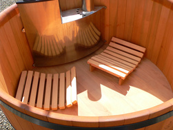 The cedar inside of a classic Lignum Hot Tub, with two seats, both handmade.